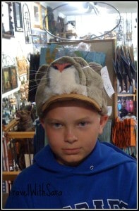 Garrett in hat shop in Colorado