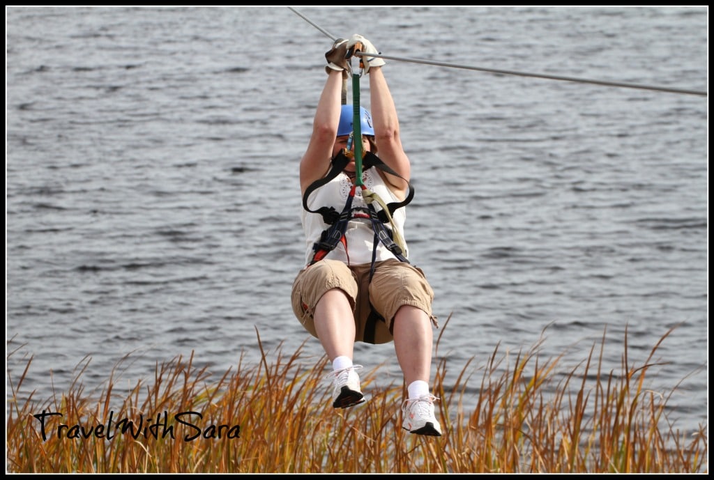 Sara ziplining over water