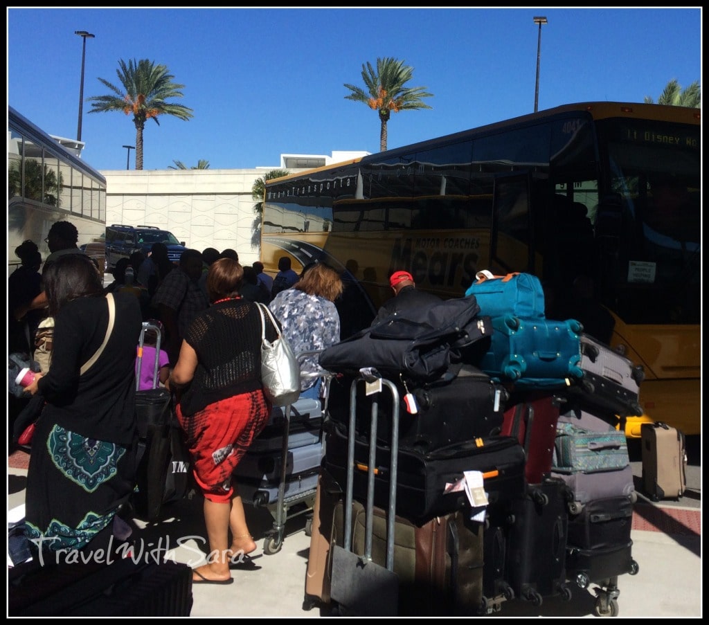 Luggage and people boarding shuttle