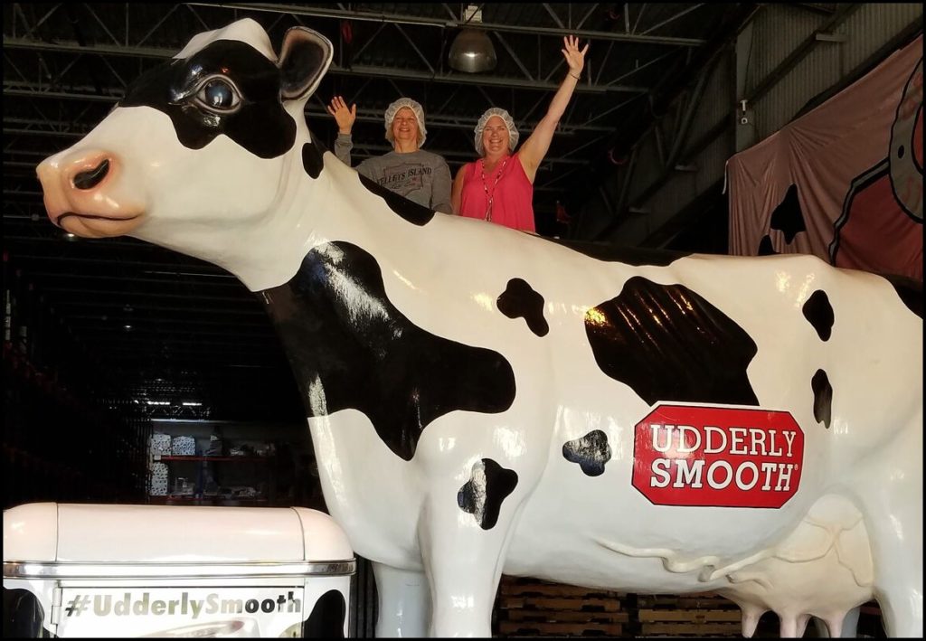 Laura and Sara with cow