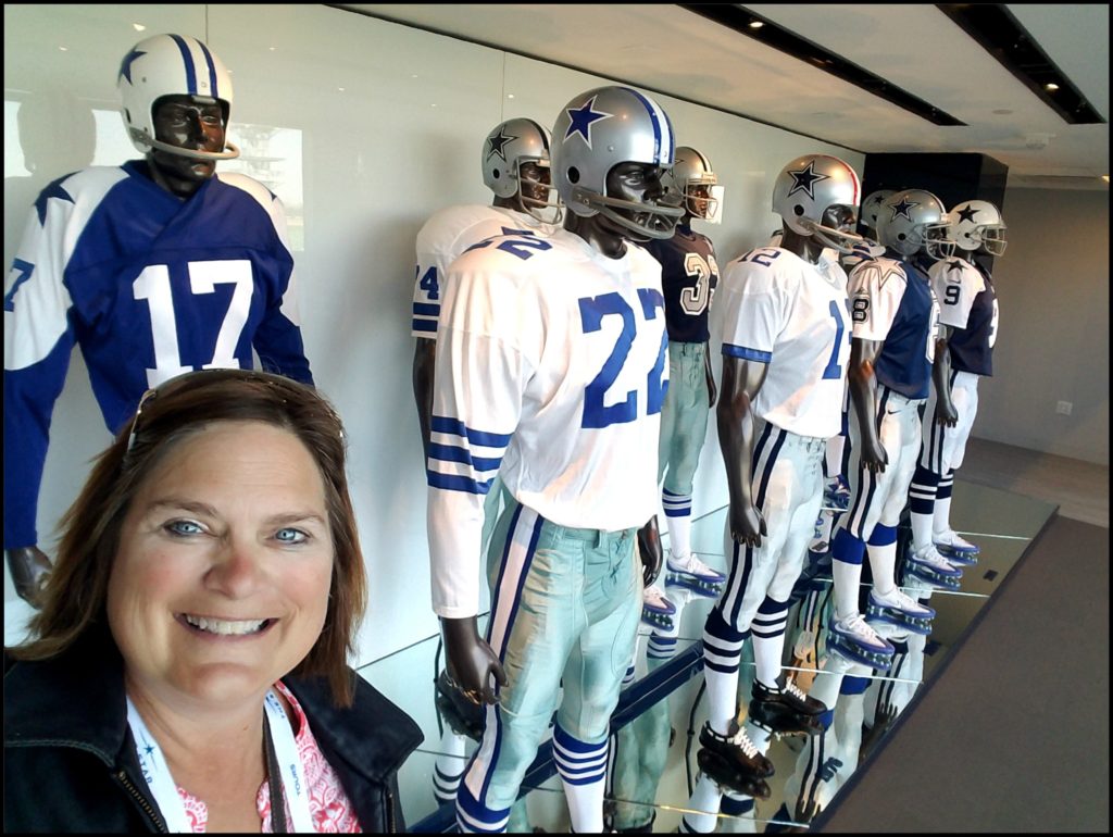 Sara with Dallas Cowboy uniforms