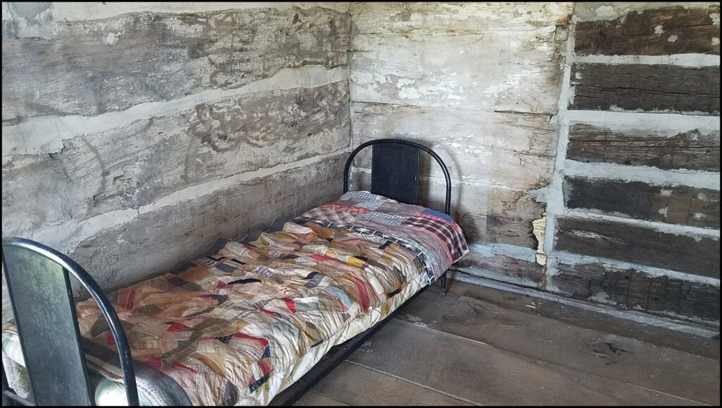 bed in cabin at emmet county museum estherville iowa