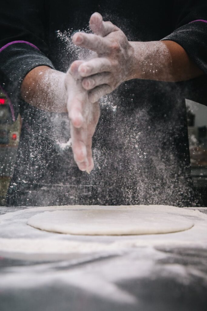 Hands Mixing Flour