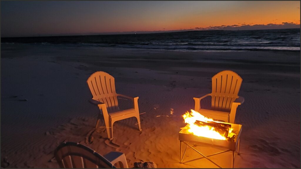 best small towns to visit bonfire on beach