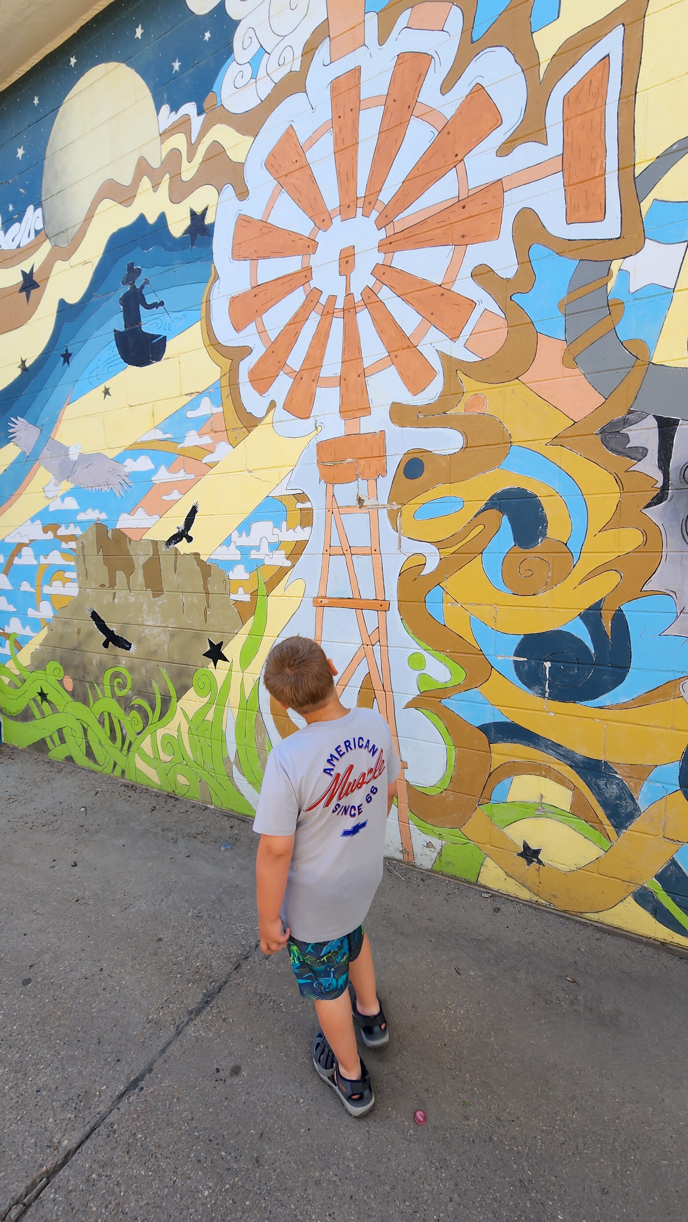 boy in art alley bismarck