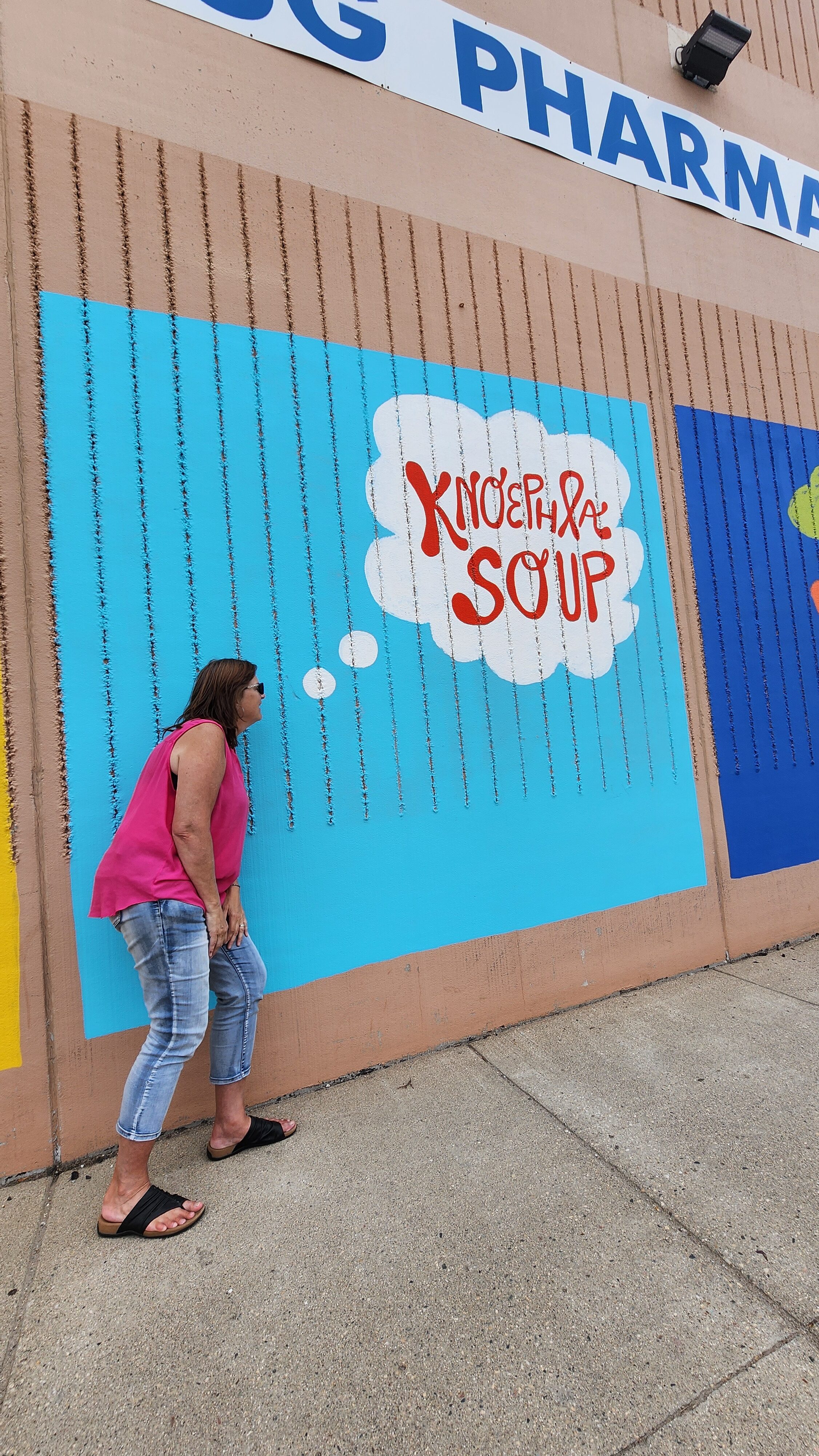 woman with mural