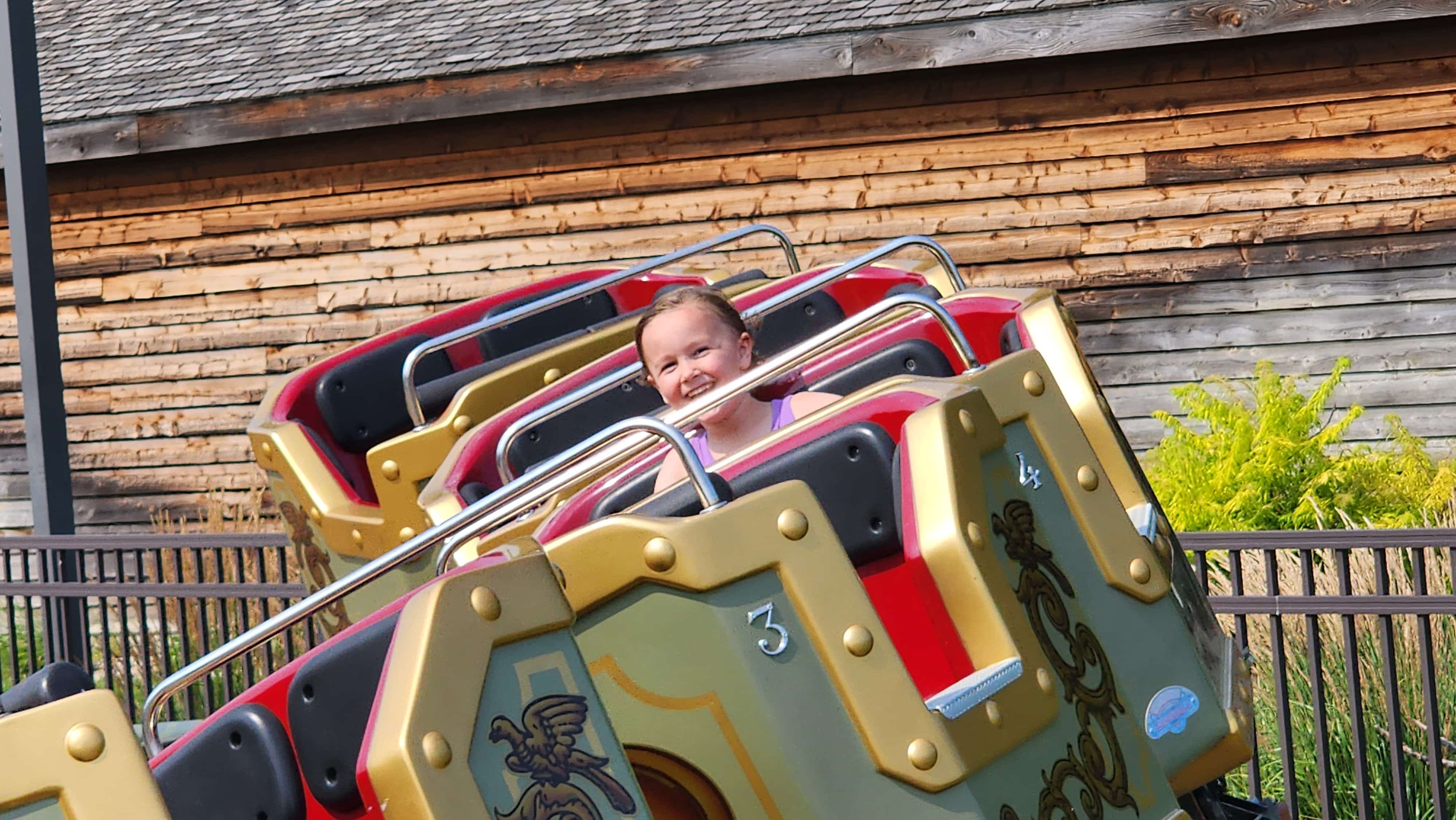 child on rollercoaster