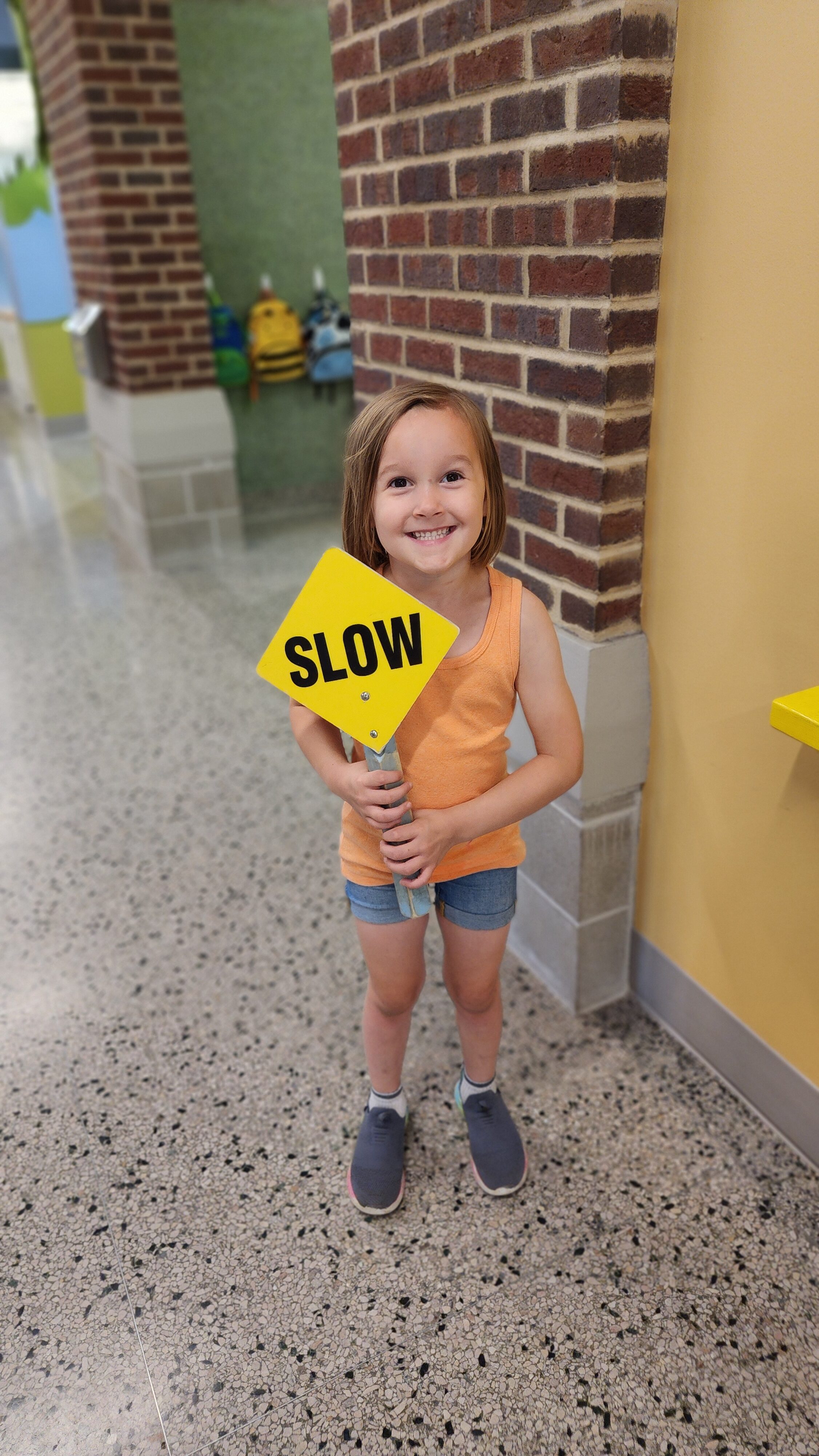 slow sign with child