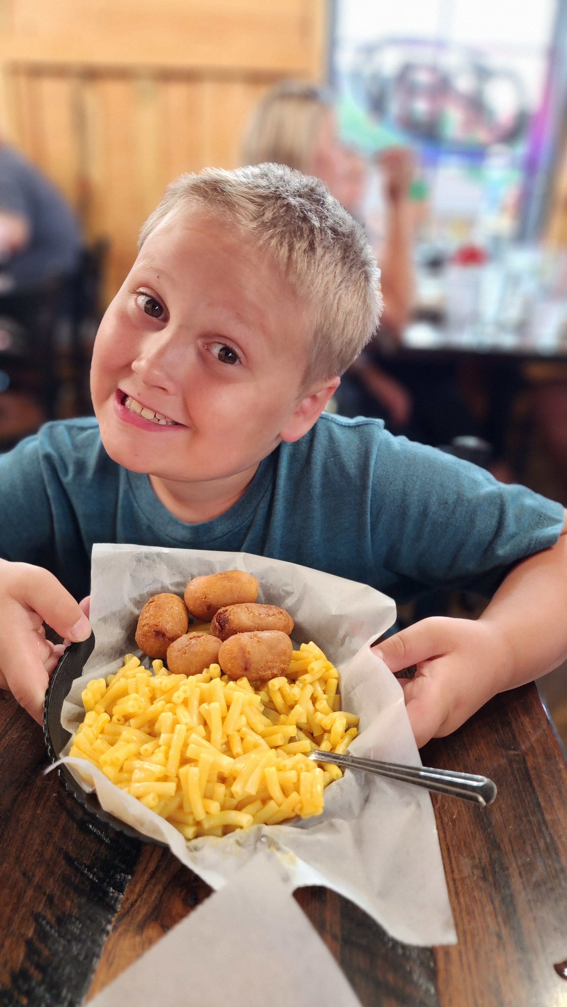 boy with mac n cheese