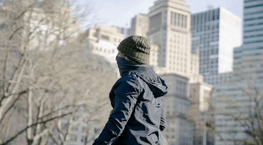 lady with winter coat in city