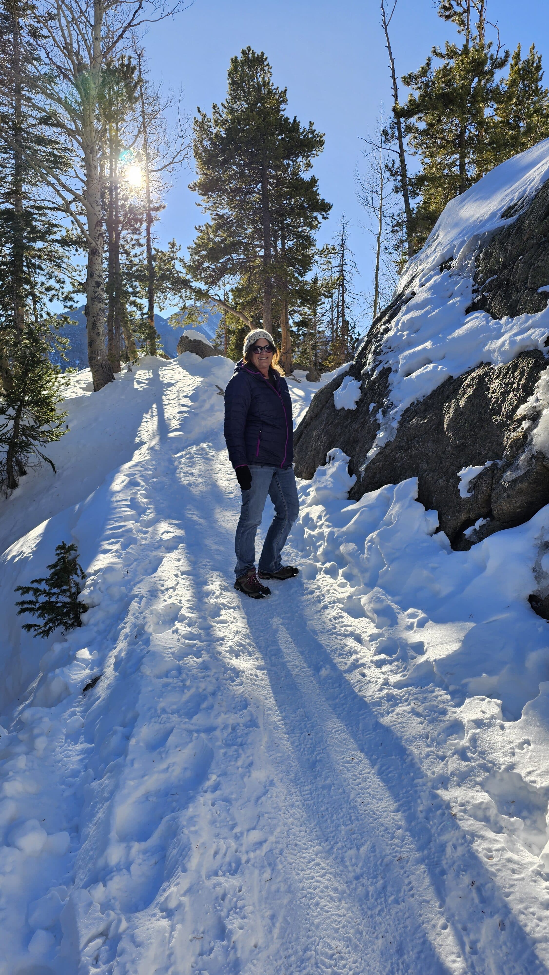 lady on winter hiking trail