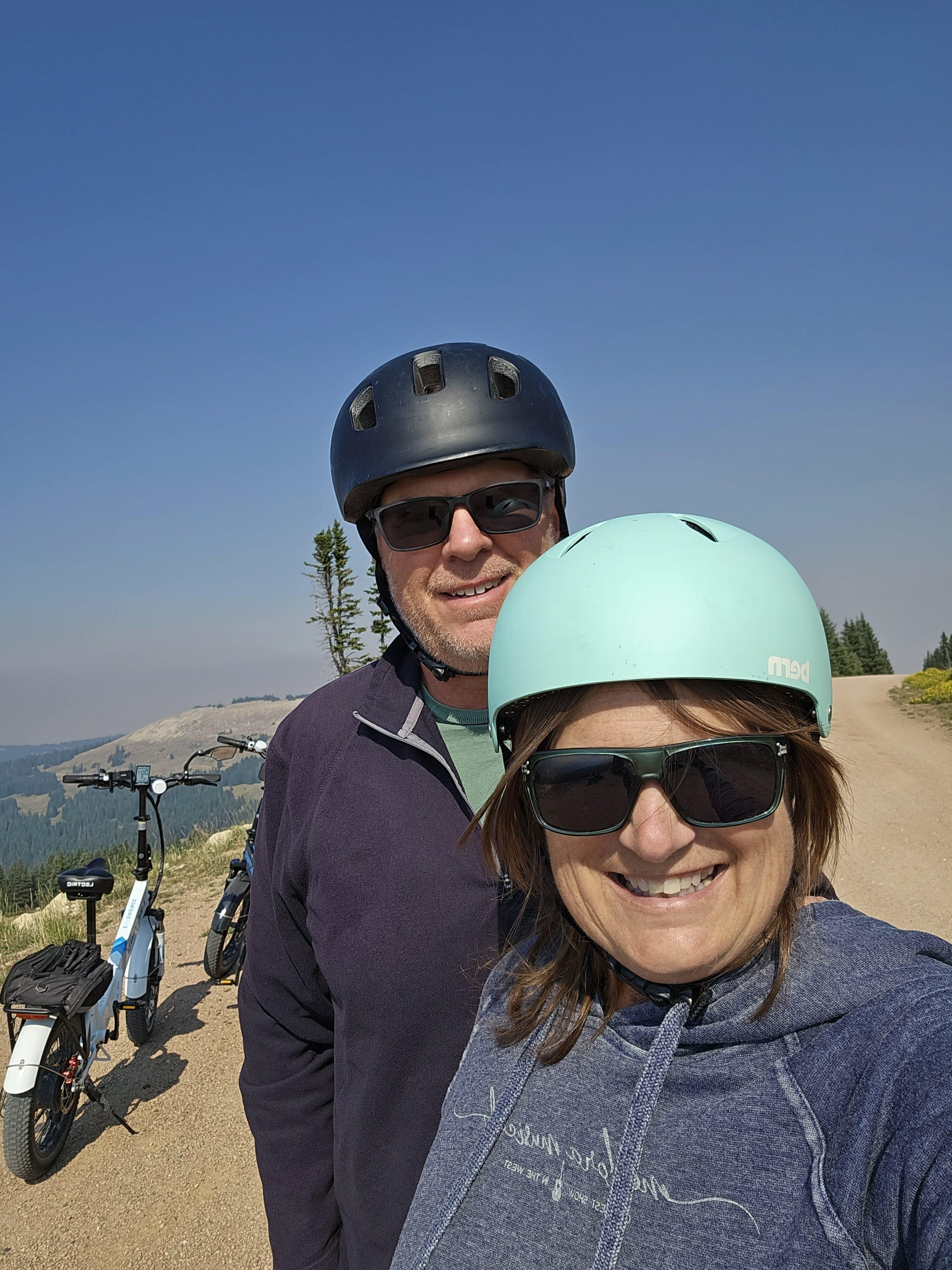 man and woman biking 