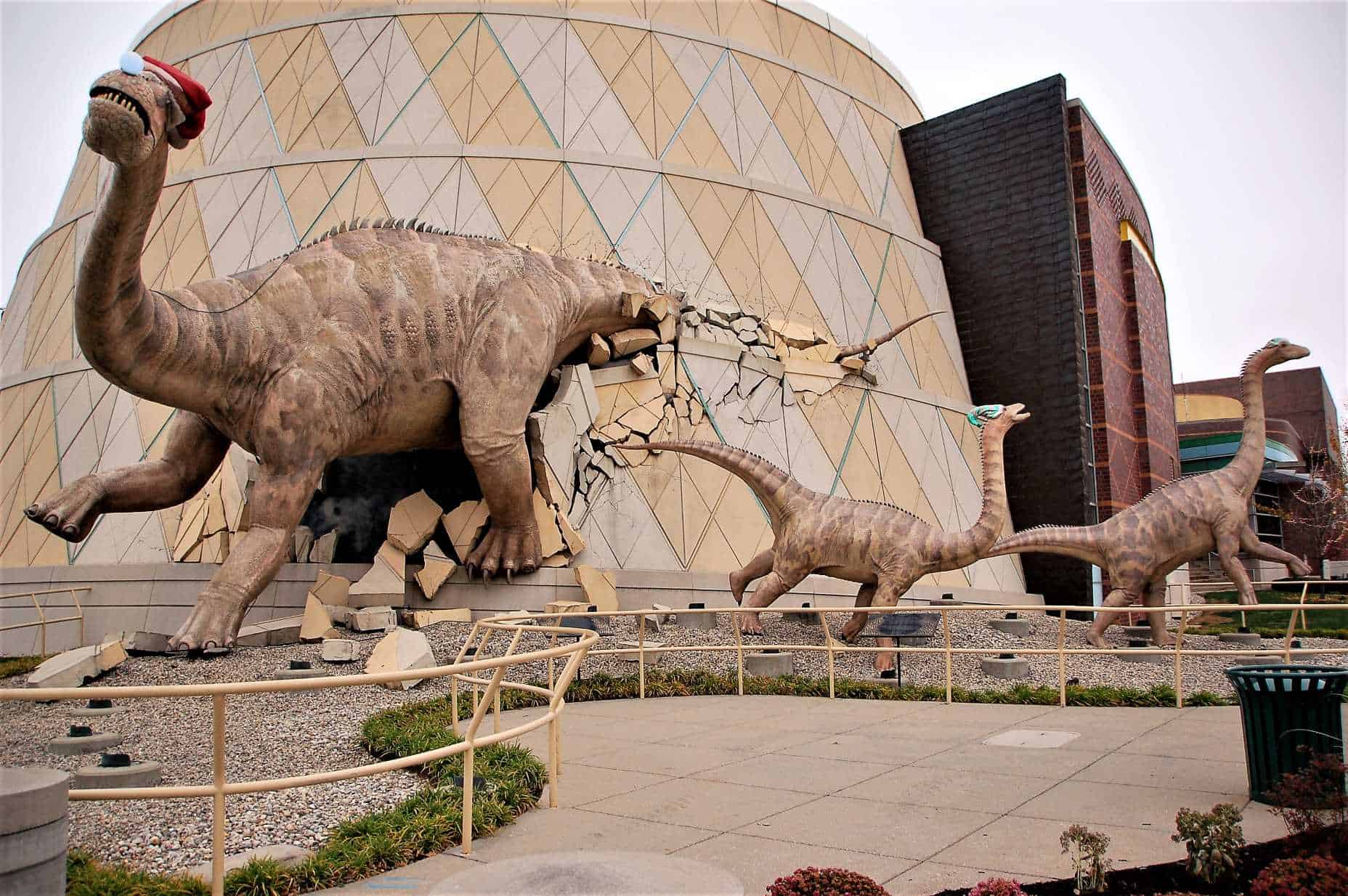 dinosaurs outside building