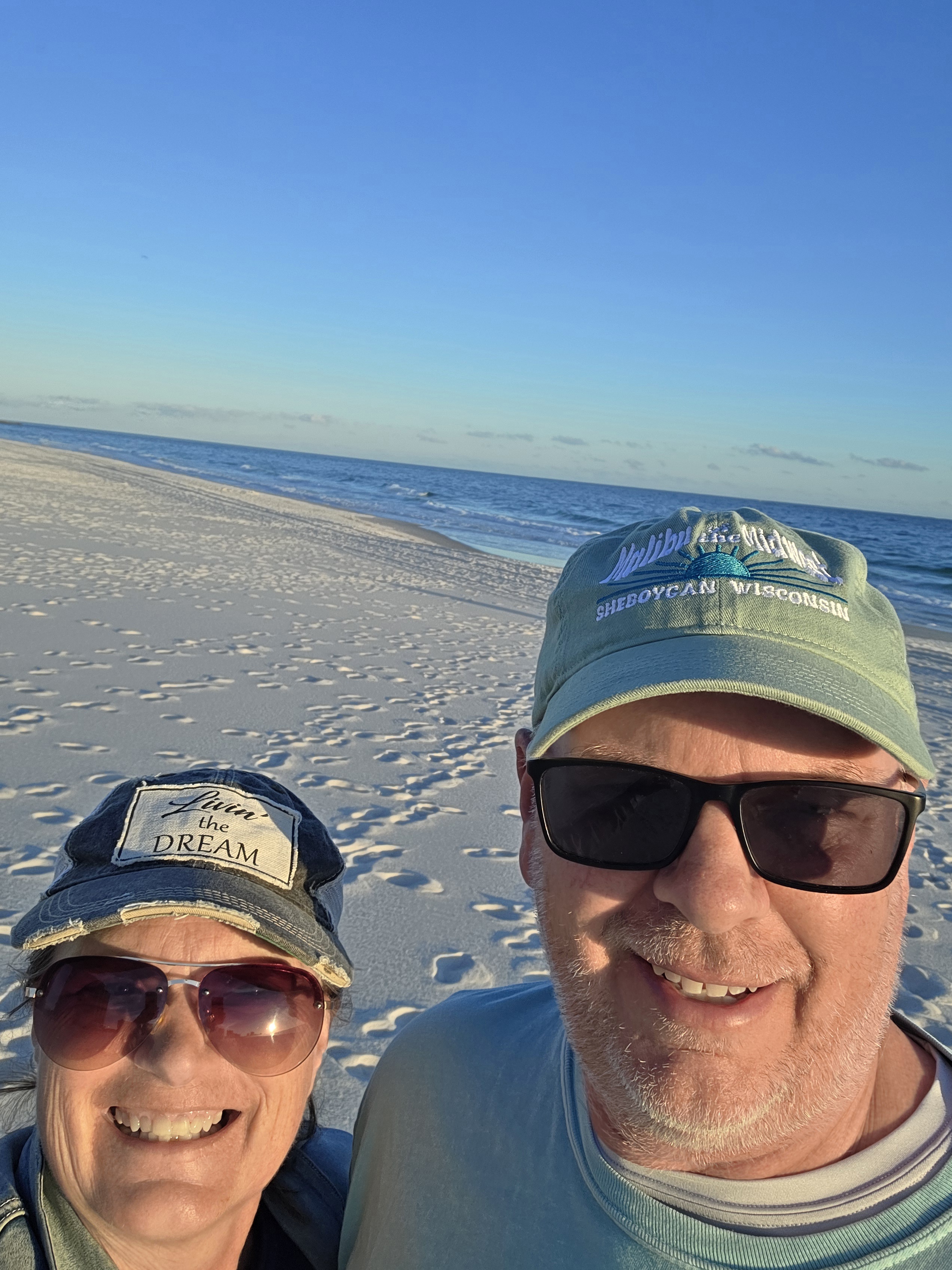 man and woman on Alabama beach